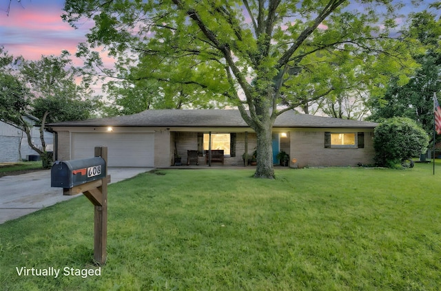 608 Timothy Dr, Fort Worth, TX 76028 - single story home featuring concrete driveway, a front yard, brick siding, and a garage