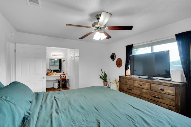 608 Timothy Dr, Fort Worth, TX 76028 - bedroom with a ceiling fan, visible vents, and wood finished floors