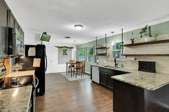 608 Timothy Dr, Fort Worth, TX 76028 - kitchen featuring decorative backsplash, open shelves, a sink, appliances with stainless steel finishes, and ornamental molding