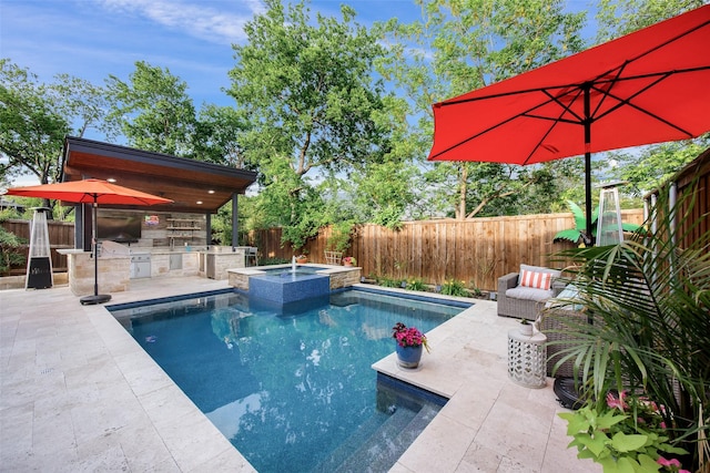 607 Parker St, Mckinney, TX 75069 - view of swimming pool with area for grilling, a fenced backyard, a pool with connected hot tub, and a patio