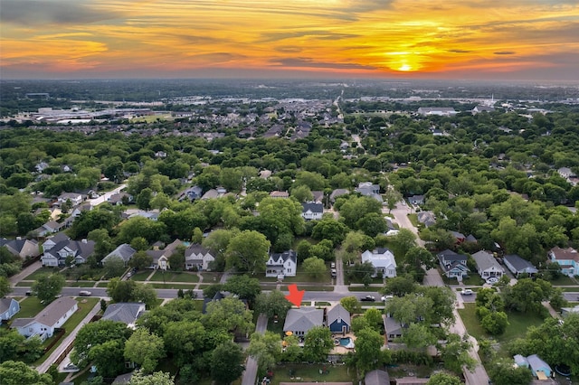 aerial view at dusk with a residential view