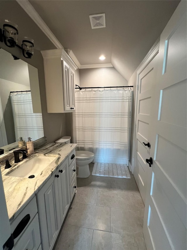 bathroom featuring vanity, tile patterned floors, toilet, visible vents, and lofted ceiling