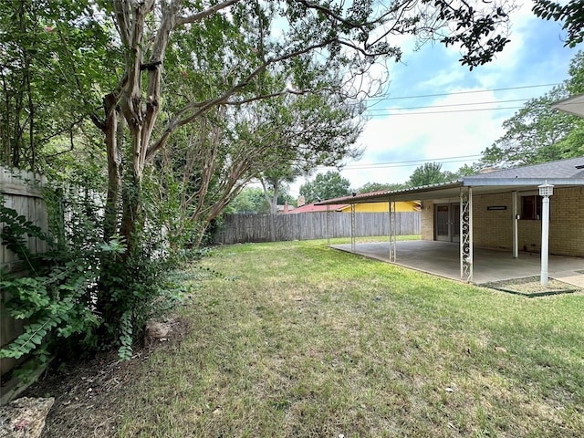 2804 Hollywood Dr, Arlington, TX 76013 - view of yard featuring a fenced backyard and a patio area