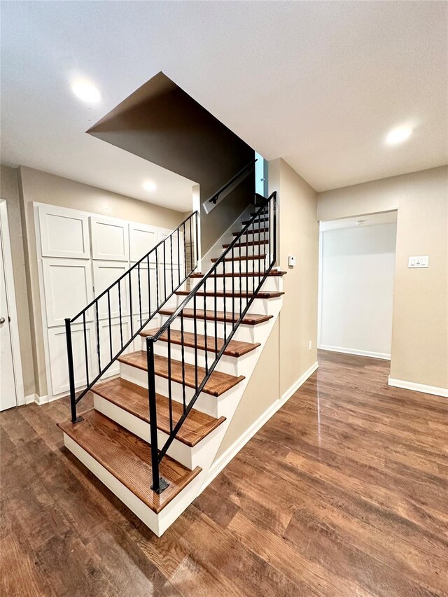 2804 Hollywood Dr, Arlington, TX 76013 - stairway with recessed lighting, wood finished floors, and baseboards