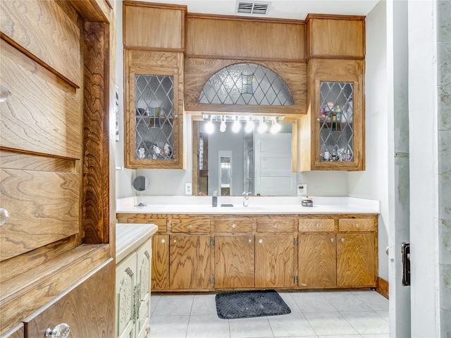 bathroom featuring tile patterned floors, visible vents, and vanity