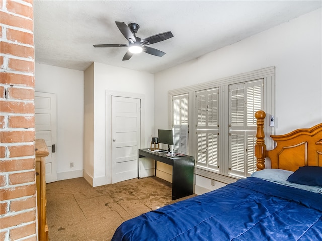 bedroom with baseboards and ceiling fan