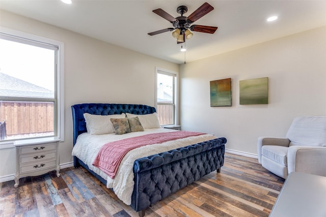 bedroom with baseboards, wood finished floors, recessed lighting, and a ceiling fan