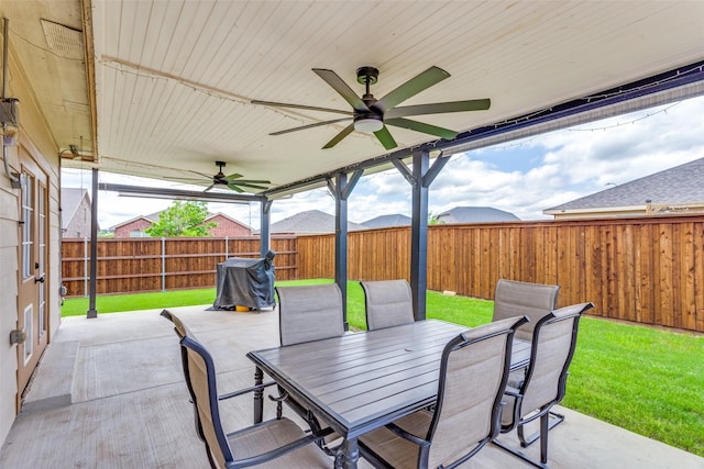 view of patio / terrace featuring ceiling fan and outdoor dining area
