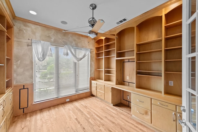 unfurnished office with light wood-style floors and visible vents