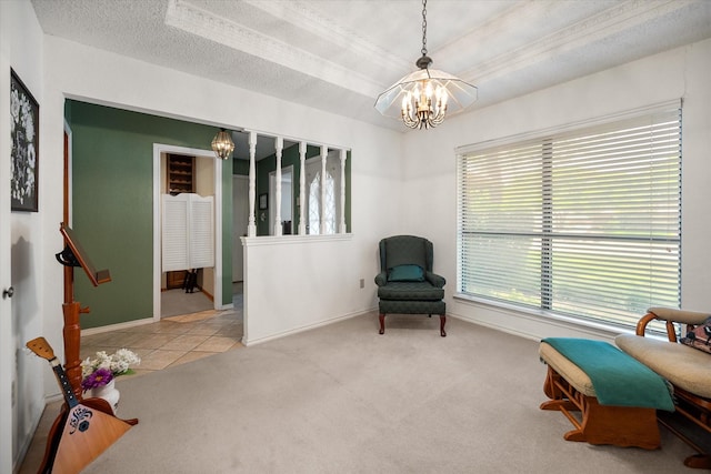 living area featuring a chandelier, baseboards, and carpet floors