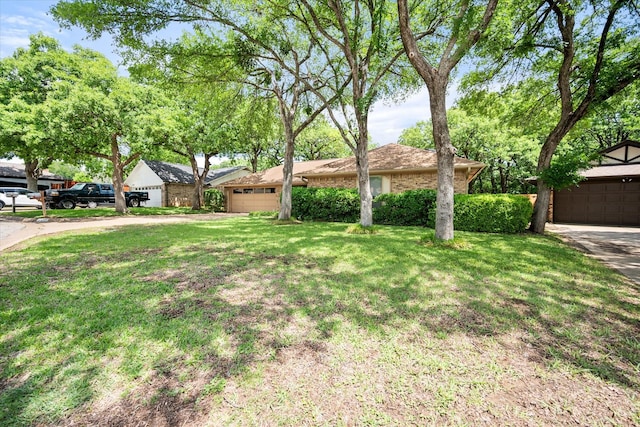 view of front of property with brick siding and a front lawn