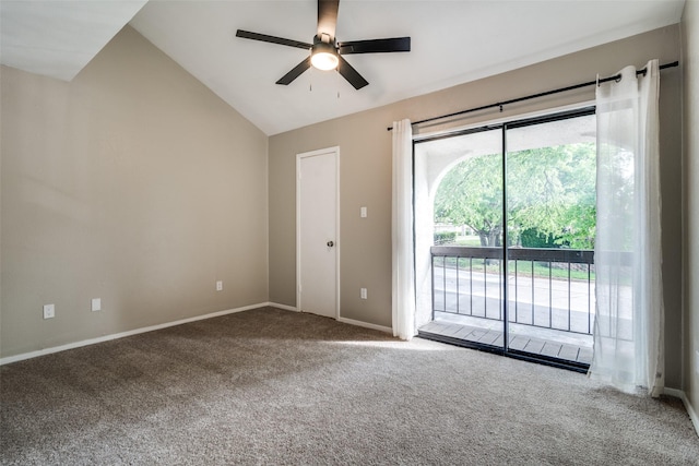 carpeted empty room with a ceiling fan, baseboards, and lofted ceiling