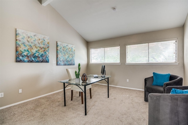 carpeted office with baseboards and lofted ceiling