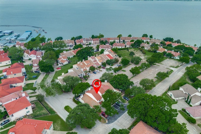 aerial view with a water view and a residential view