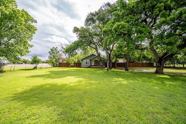 view of yard with fence