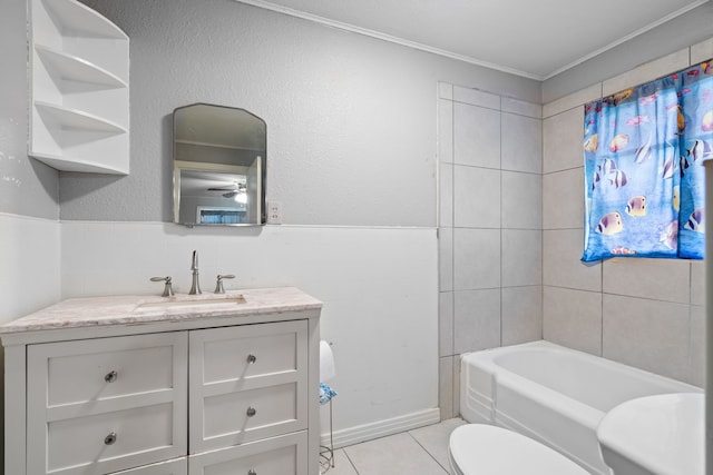 full bathroom with toilet, ornamental molding, tile walls, tile patterned floors, and vanity