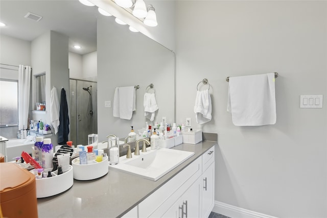 1164 Red Hawk Ln, Forney, TX 75126 - full bath with recessed lighting, vanity, baseboards, visible vents, and a stall shower