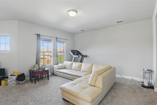 1164 Red Hawk Ln, Forney, TX 75126 - carpeted living room with baseboards, visible vents, and plenty of natural light