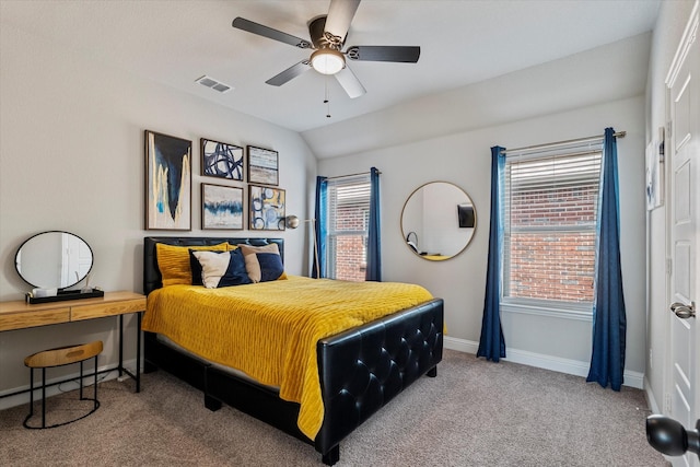 carpeted bedroom featuring baseboards, visible vents, and ceiling fan
