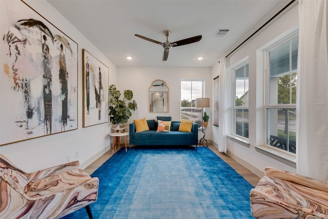 sitting room featuring visible vents, ceiling fan, baseboards, recessed lighting, and wood finished floors