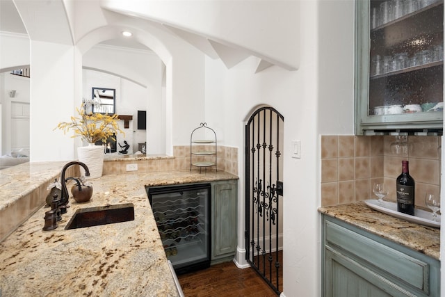 dining room featuring an inviting chandelier, baseboards, crown molding, and a healthy amount of sunlight