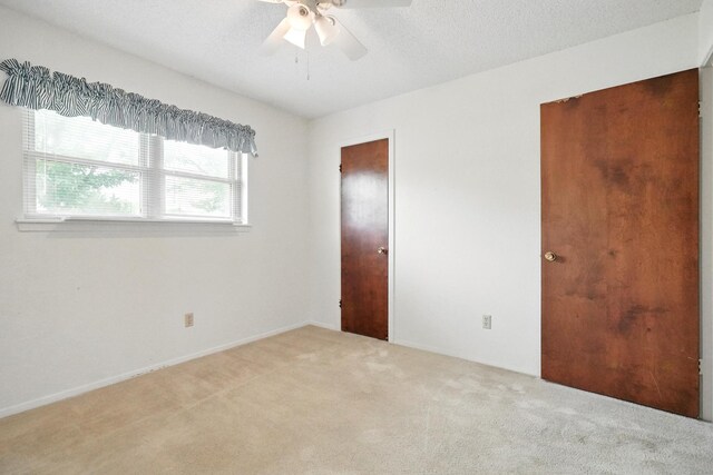 2134 Braune Rd, Abilene, TX 79606 - unfurnished bedroom featuring carpet and ceiling fan