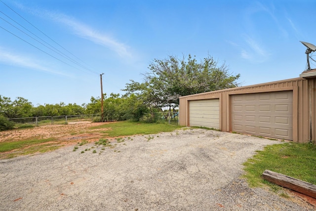 2134 Braune Rd, Abilene, TX 79606 - detached garage featuring fence