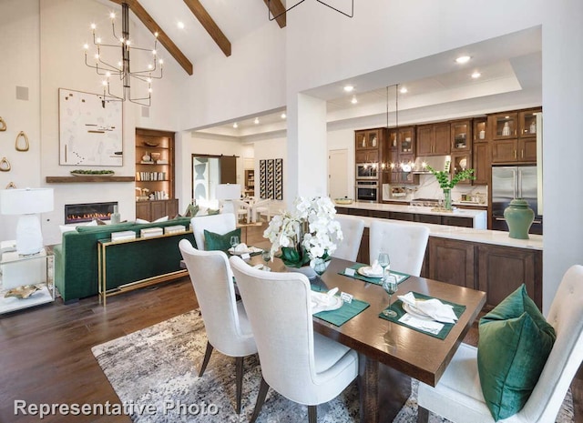 dining space featuring a chandelier, beam ceiling, recessed lighting, dark wood-type flooring, and high vaulted ceiling