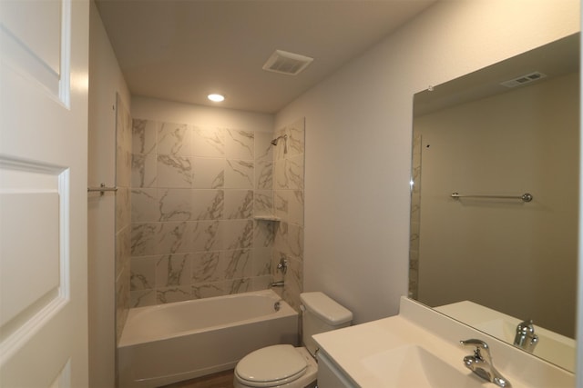 full bath featuring toilet, vanity, visible vents, and shower / bath combination