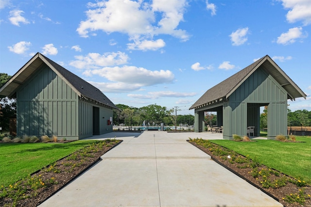 view of property's community featuring a lawn and a gazebo