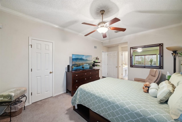 bedroom with a textured ceiling, crown molding, baseboards, light carpet, and a ceiling fan