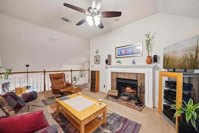 living area with a brick fireplace, ceiling fan, visible vents, vaulted ceiling, and light carpet