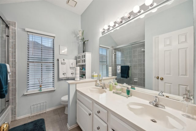 full bathroom with a sink, a shower with door, toilet, vaulted ceiling, and tile patterned flooring