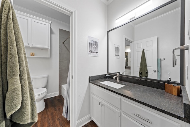full bath with crown molding, toilet, wood finished floors, and vanity