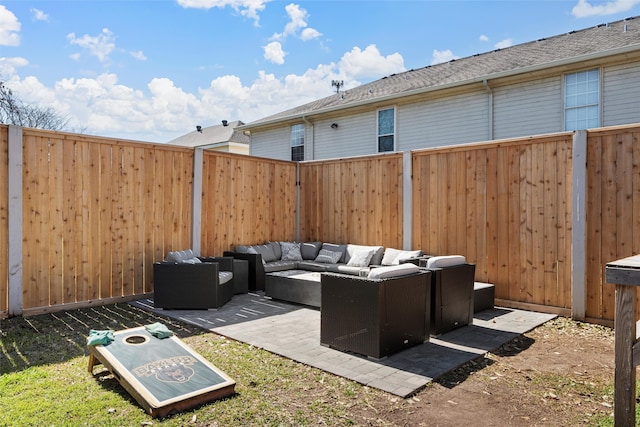 view of patio with outdoor lounge area and a fenced backyard