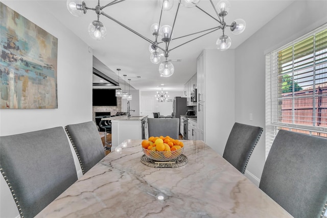 dining area with a notable chandelier and visible vents