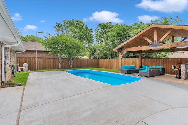 view of swimming pool with a gazebo, a patio, an outdoor living space, and a fenced backyard