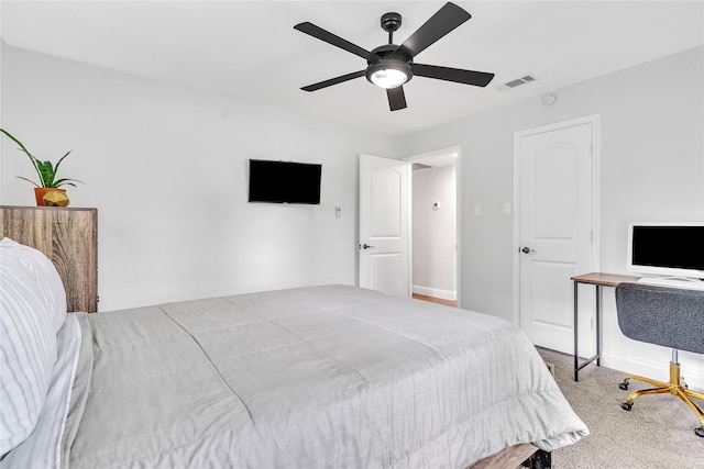 bedroom with visible vents, ceiling fan, carpet floors, and baseboards