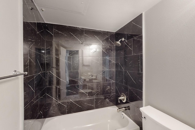 full bathroom with toilet and  shower combination