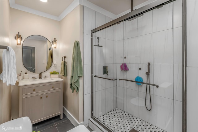bathroom featuring a stall shower, toilet, baseboards, and vanity