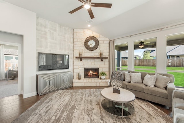 1009 Canuela Way, Justin, TX 76247 - living area with ceiling fan, vaulted ceiling, wood finished floors, and visible vents
