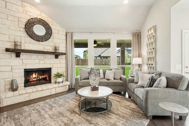 1009 Canuela Way, Justin, TX 76247 - living area with wood finished floors, a ceiling fan, a fireplace, and vaulted ceiling
