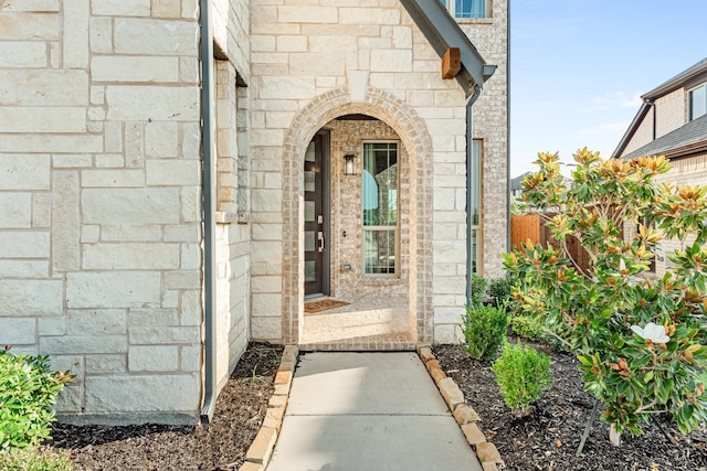1009 Canuela Way, Justin, TX 76247 - entrance to property featuring fence and stone siding