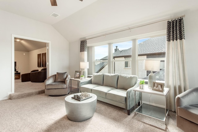 1009 Canuela Way, Justin, TX 76247 - living room with visible vents, a ceiling fan, carpet floors, and vaulted ceiling