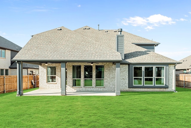 1009 Canuela Way, Justin, TX 76247 - rear view of property with a shingled roof, a patio area, a fenced backyard, a lawn, and a ceiling fan