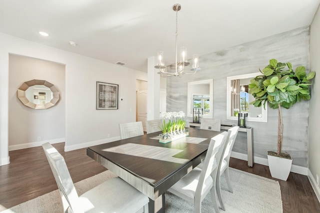 1009 Canuela Way, Justin, TX 76247 - dining space featuring visible vents, an inviting chandelier, wood finished floors, and baseboards