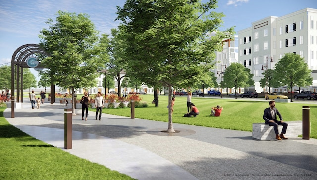view of home's community featuring a lawn
