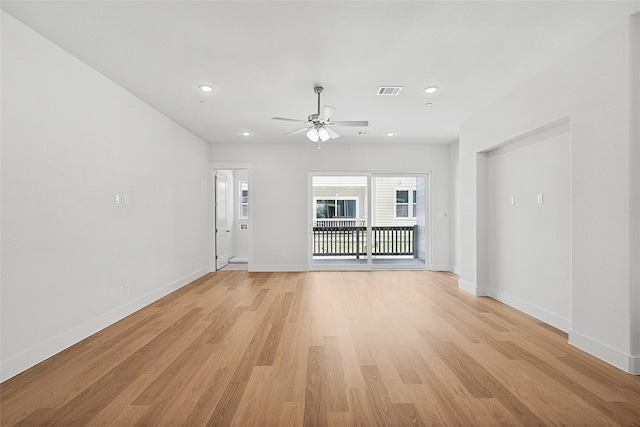 unfurnished living room with light wood-type flooring, recessed lighting, a ceiling fan, and baseboards