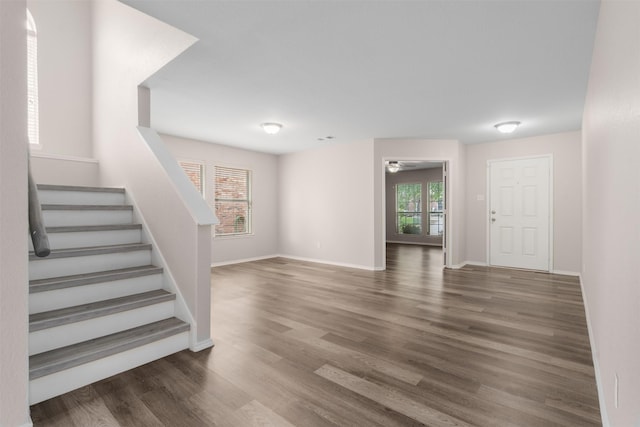 13140 Fencerow Rd, Fort Worth, TX 76244 - unfurnished living room with baseboards, ceiling fan, stairs, and wood finished floors