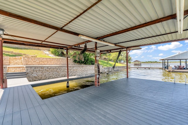 6107 Grande Cove Ct, Granbury, TX 76049 - dock area with boat lift and a water view